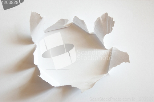 Image of hole in paper