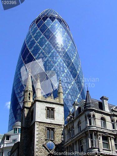 Image of Cone building behind church