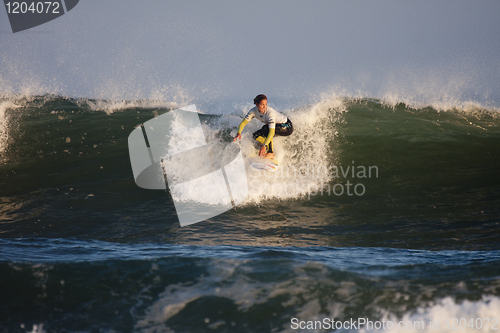 Image of Woman surfer