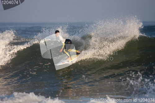 Image of Female surfer