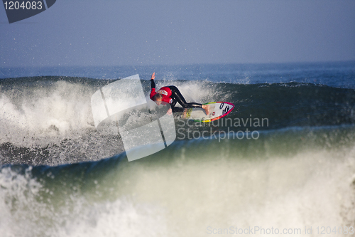 Image of Woman surfer