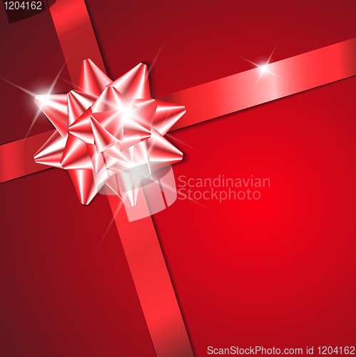 Image of Red bow on a red ribbon with red background 