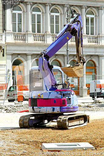 Image of Purple excavator