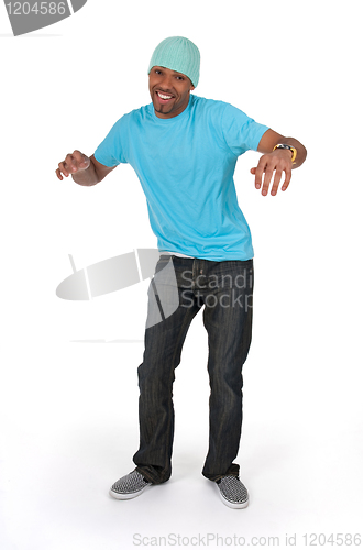 Image of Funny guy in a blue t-shirt dancing