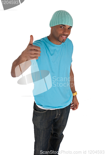 Image of Smiling young man in a blue with thumb up