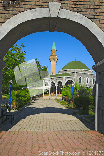 Image of mosque and palms tree