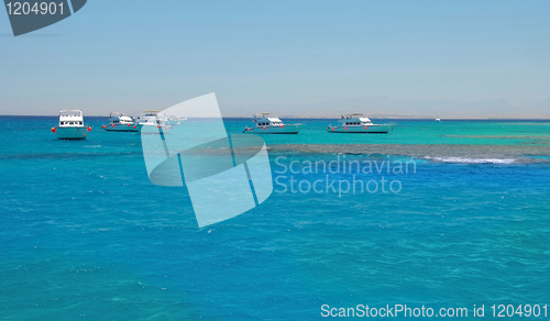 Image of Boats on blue sea water in Egypt