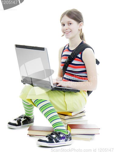 Image of teenage girl with a laptop