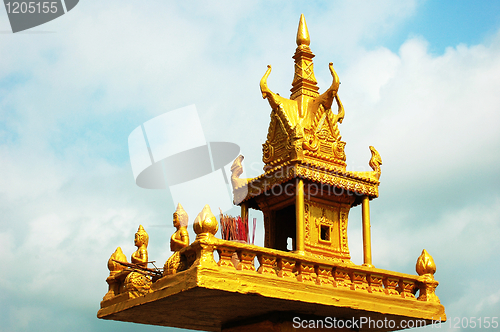 Image of Golden shrine against sky in Cambodia