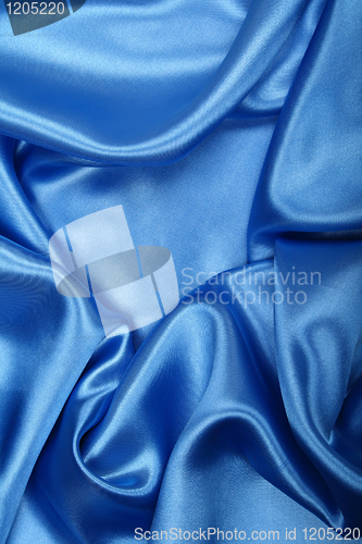 Image of Smooth elegant blue silk as background 