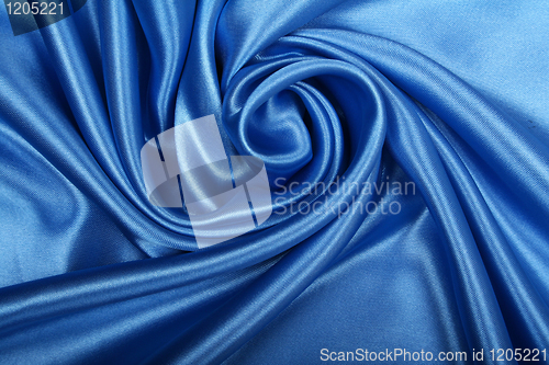 Image of Smooth elegant blue silk as background 