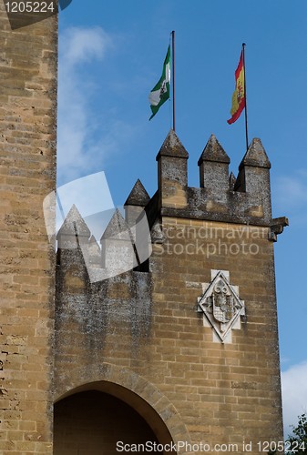 Image of Almodovar Del Rio medieval castle with flags of Spain and Andalusia