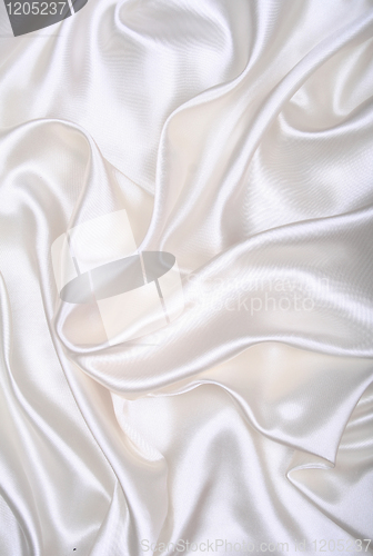 Image of Smooth elegant white silk as background 