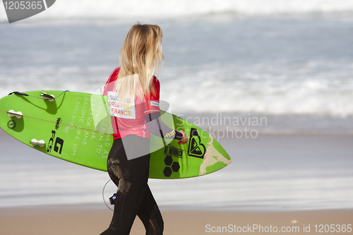 Image of Surfer walking