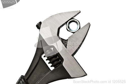 Image of Adjustable wrench and nut