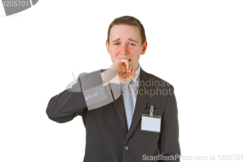 Image of Tired young businessman yawning