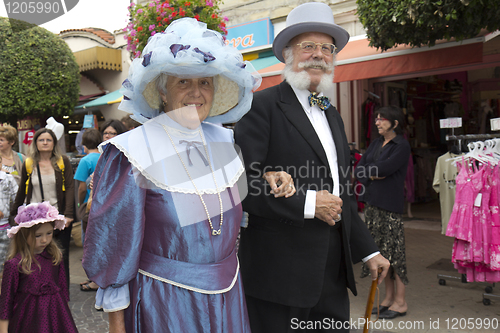 Image of An elderly couple during the parade.