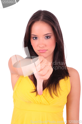 Image of woman with thumb down gesture and mobile phone 