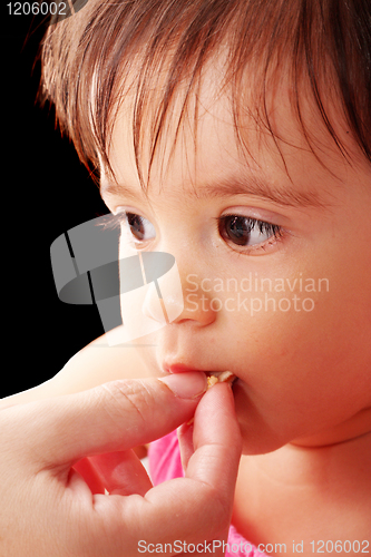 Image of Cute little baby eat food 
