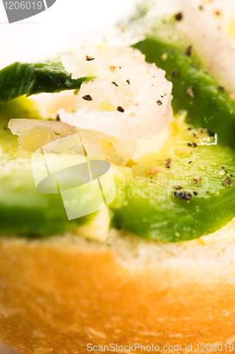 Image of Sandwich with avocado on a wooden board 