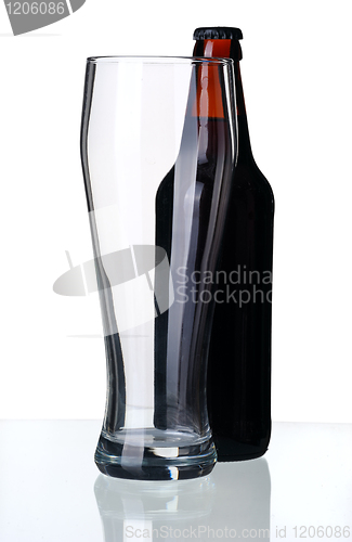 Image of Bottle of dark beer and glass, isolated