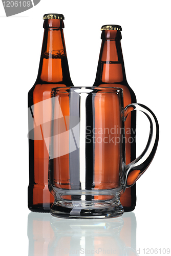 Image of Glass mug and two bottles of beer, isolated