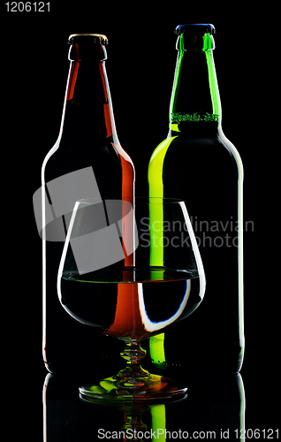 Image of Bottles of beer, isolated on a black background