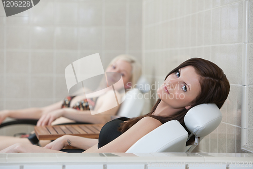 Image of Two pretty Caucasian woman resting