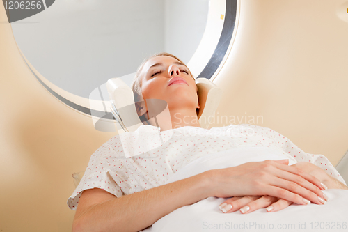 Image of Female Taking CT Scan