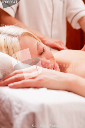 Image of Relaxed Woman in Spa