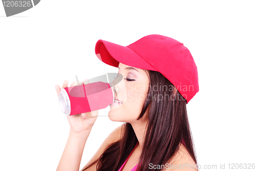 Image of Young attractive woman drinks juice 