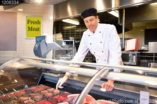 Image of Fresh Meat Counter with Butcher