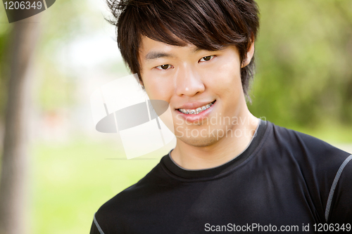 Image of Portrait of a young man smiling