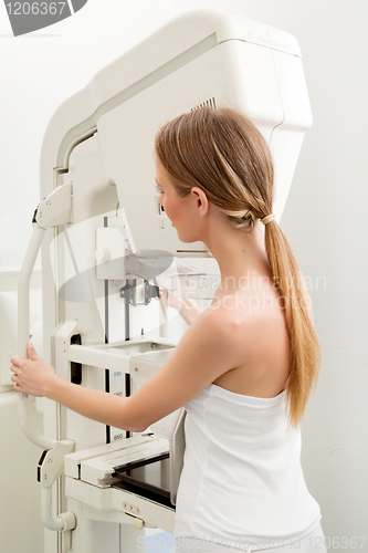 Image of Woman Taking Mammogram