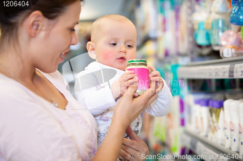 Image of Mother with Baby in Supermarket