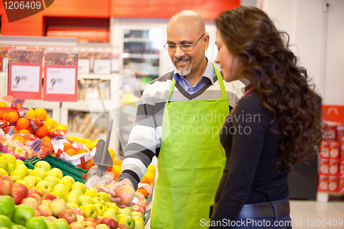 Image of Woman Buying Groceries