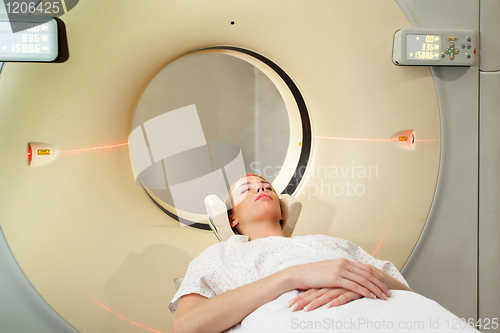 Image of Woman Taking CT Scan