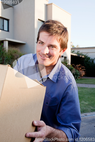 Image of Moving Man with Box