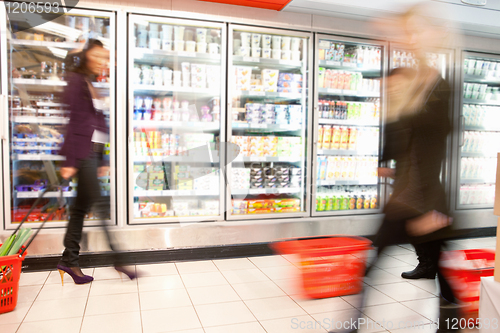 Image of Busy Supermarket With Motion Blur