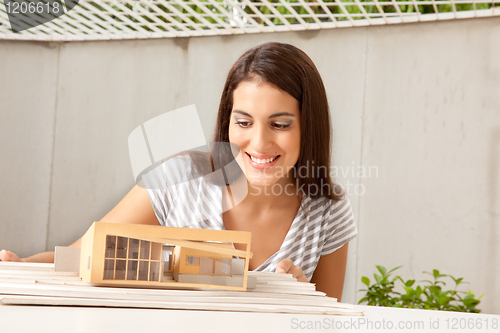 Image of Architect with Model House