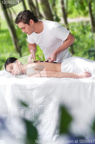 Image of Hot mineral sacred stone treatment