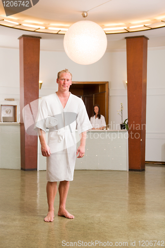 Image of Man standing in Spa