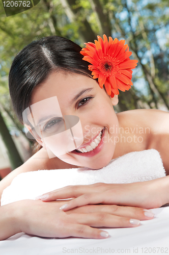 Image of Girl with flower in her hair