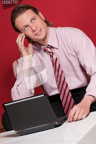 Image of Businessman talking over the cellphone