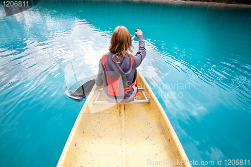 Image of Woman rowing boat