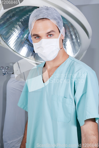 Image of Confident doctor looking at camera