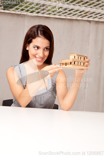 Image of Happy Architect with Model