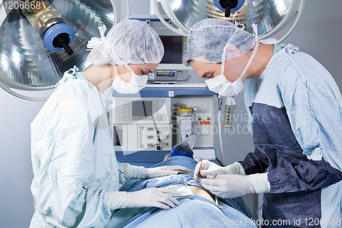 Image of Medical professionals performing an operation