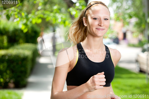 Image of Beautiful woman jogging