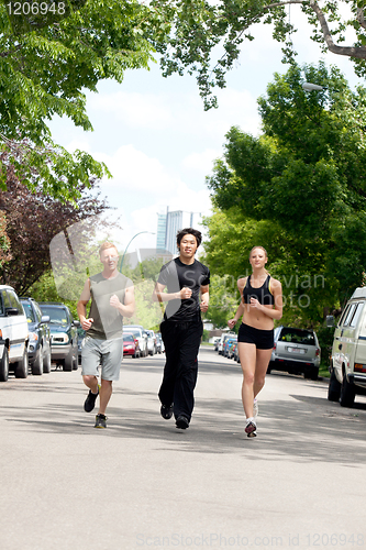 Image of People running on the street